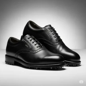 Premium black golf shoes made of leather, highlighting their classic look and quality.
