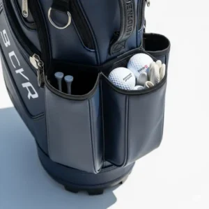 A golf shoe bag featuring convenient side pockets, perfect for storing golf accessories like balls, tees, and gloves.