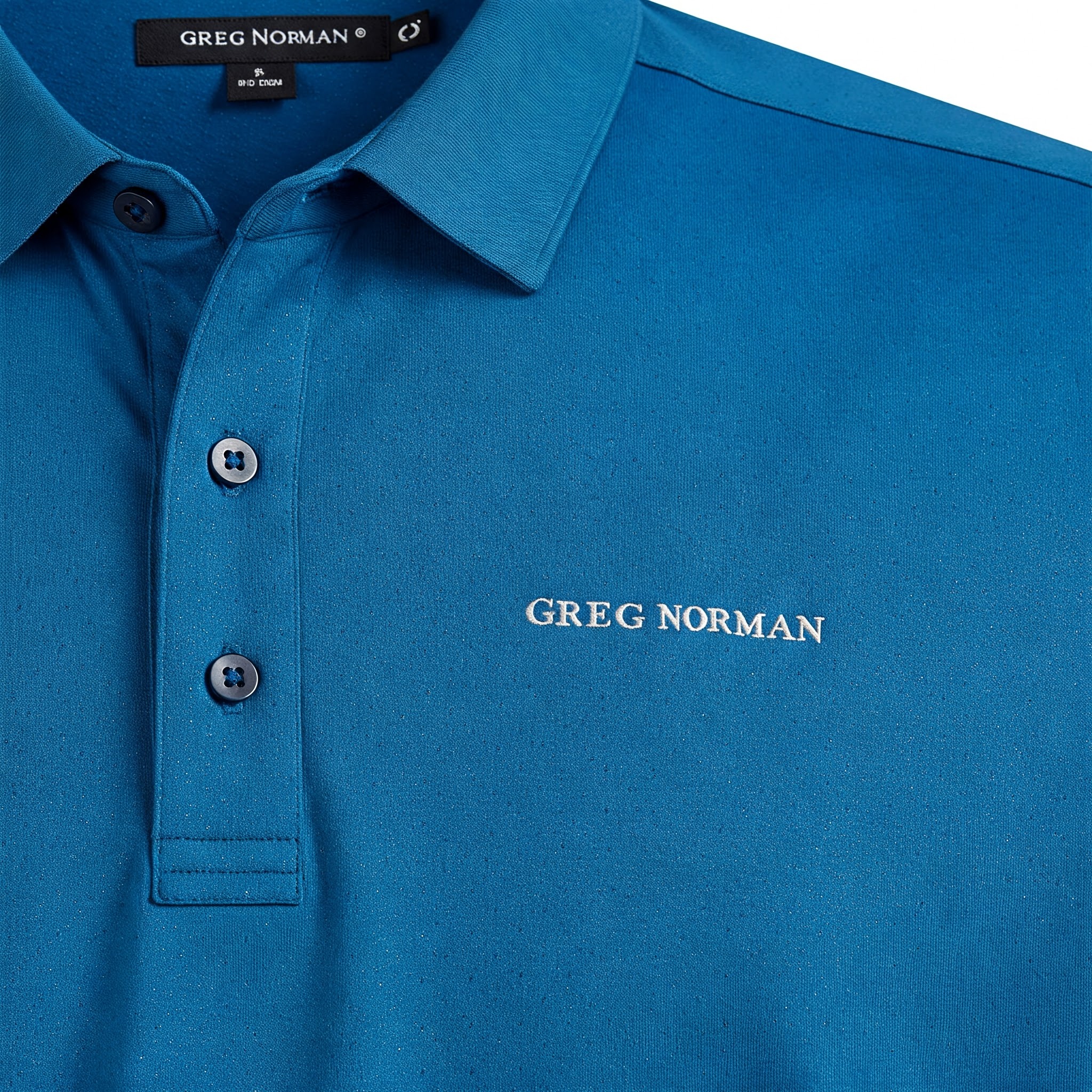 Close-up of a high-performance greg norman golf shirts, showcasing its fabric and design details.