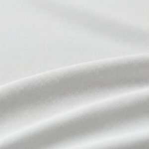 Detailed view of the breathable and comfortable fabric of a white golf shirt.