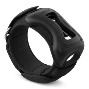 Close-up of a black golf wrist trainer device, highlighting its adjustable strap and ergonomic design for golfers.