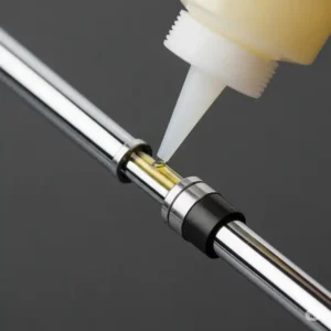 "A detailed view of epoxy being applied to a golf club shaft, an essential step in installing golf club shaft extensions."