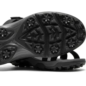 "Detail of the high-traction outsole on golf sandals for women, designed for excellent grip on various course terrains."