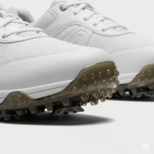 Close-up of white spikeless ladies golf shoes on sale, highlighting the comfortable design and durable sole.