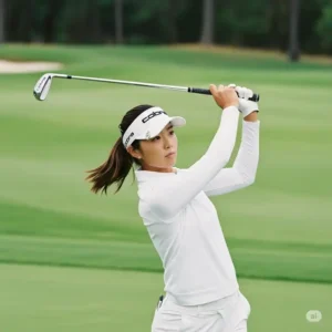 Woman golfer demonstrating a smooth swing with a Cobra ladies golf iron, illustrating ease of use and shot accuracy on the course.