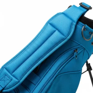 Close-up of the comfortable, padded shoulder strap on a childrens golf bag designed for ergonomic carrying.