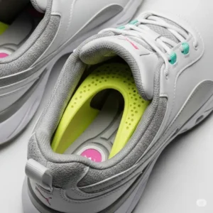  Interior view of Puma women's golf shoes highlighting cushioning and arch support for all-day comfort.