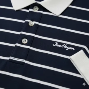 A close-up shot of a classic navy and white striped Ben Hogan golf shirt.