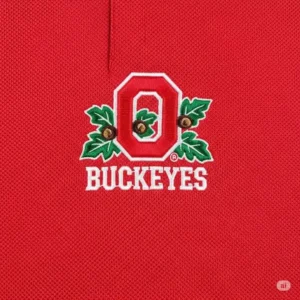 A detailed close-up of the embroidered logo on this Ohio State golf shirt.