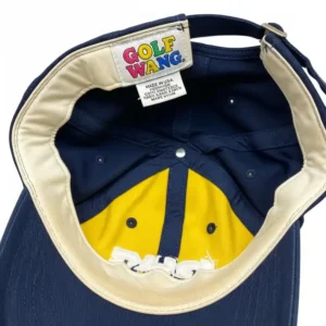 An interior view of the Golf Wang golf hat, showing the inner lining, tag, and sweatband for comfort.