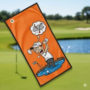 Detailed look at a novelty funny golf towel featuring a cartoon graphic of a frustrated golfer. 