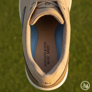 Detail of the plush, supportive insole designed for all-day comfort in johnston and murphy golf shoes. 