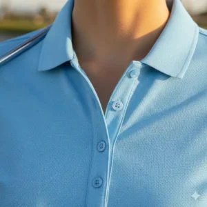 Close-up of the ribbed collar and neat button placket on the classic fit women's golf polo design.