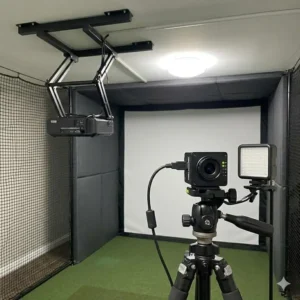 A high-speed swing analysis camera used among professional golf simulator accessories home.